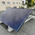 Mini-PV Anlage auf einem Flachdach aufgeständert mit Gewichten